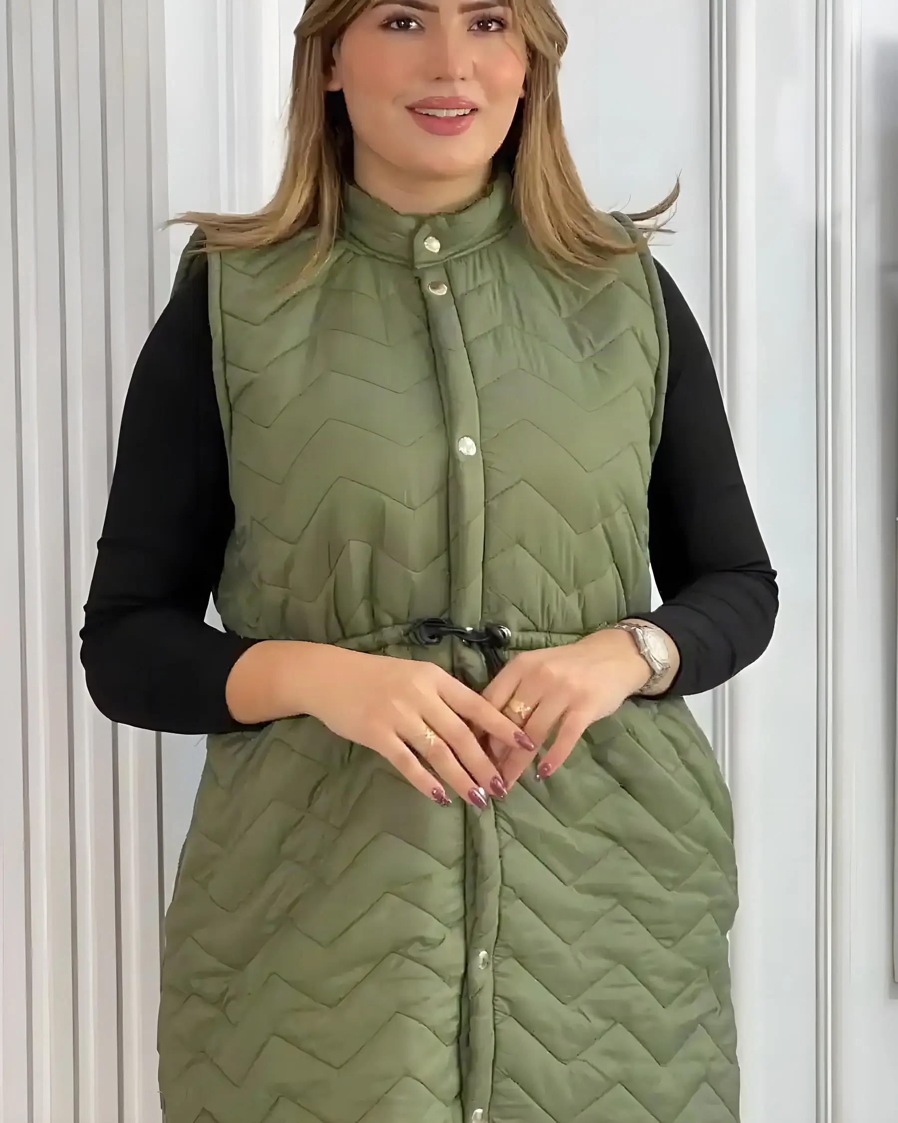 Manteau long sans manches d’hiver