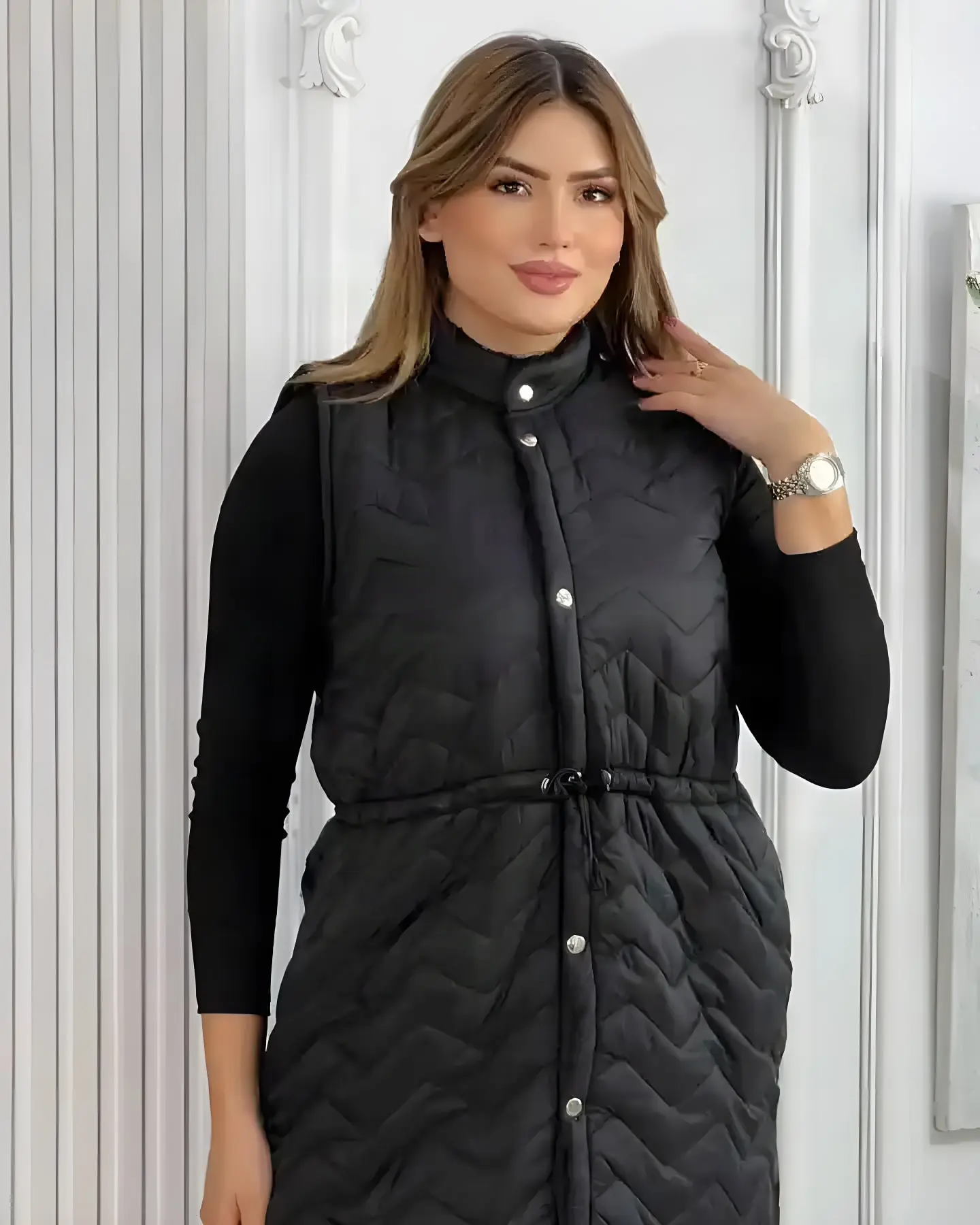 Manteau long sans manches d’hiver