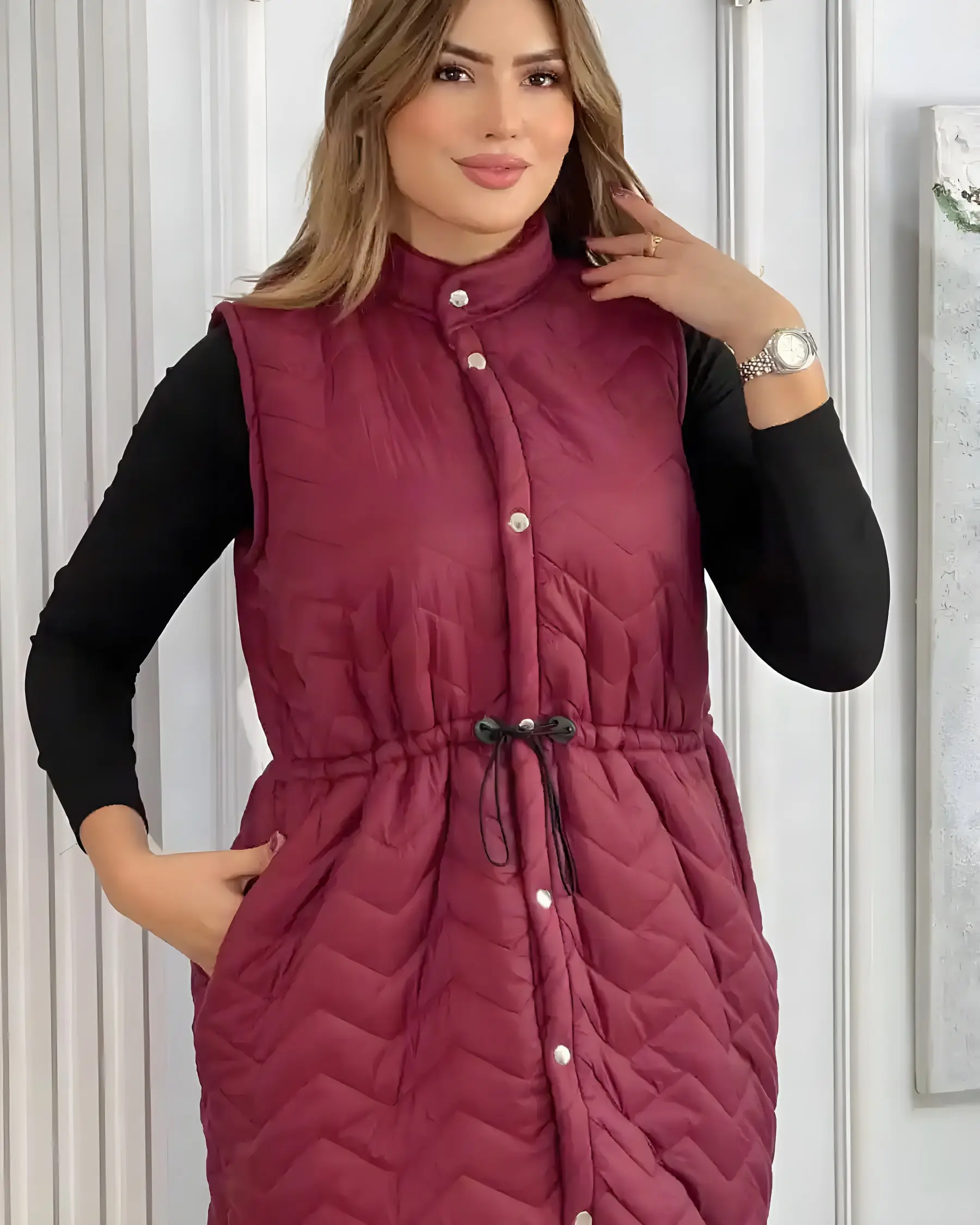 Manteau long sans manches d’hiver