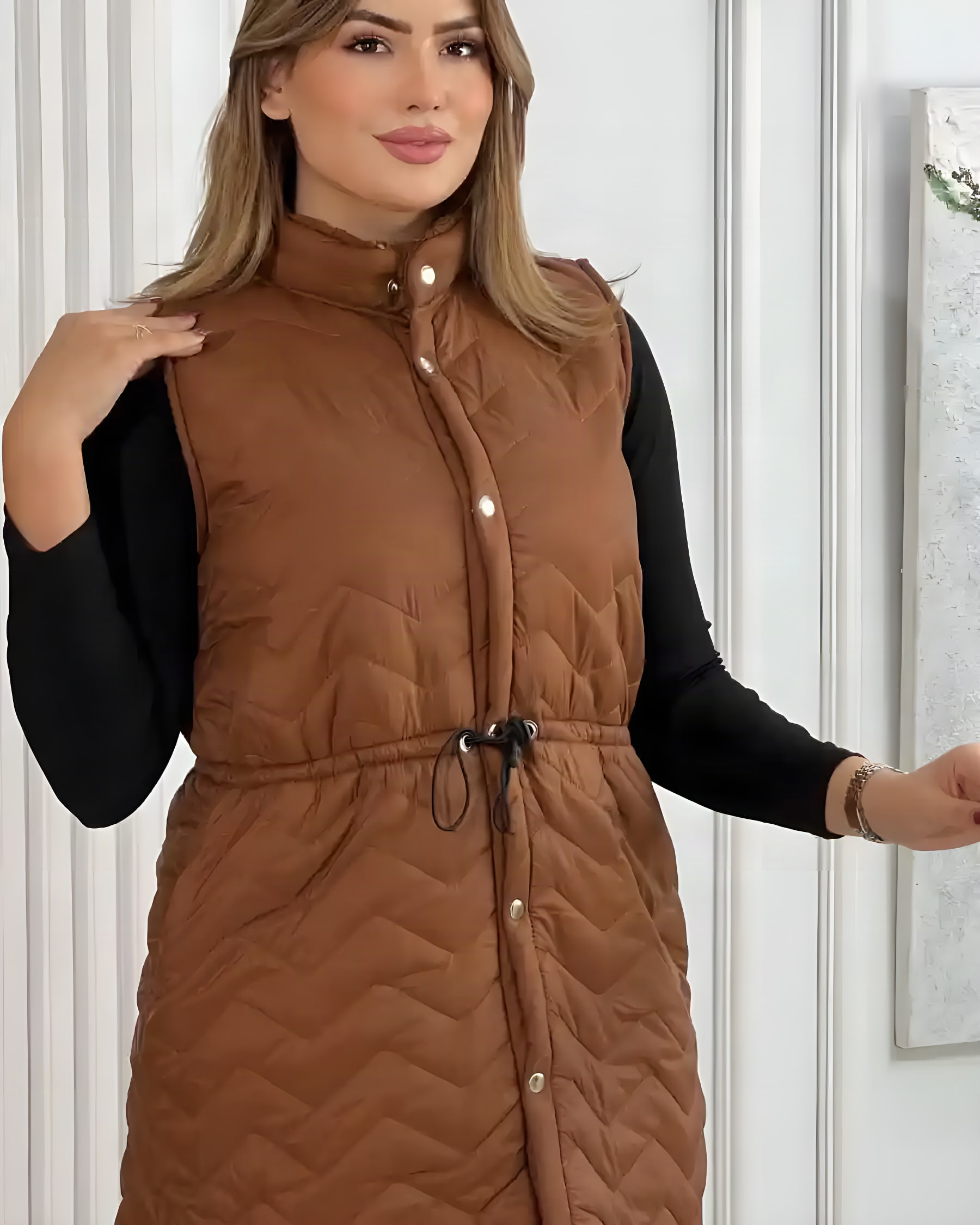 Manteau long sans manches d’hiver